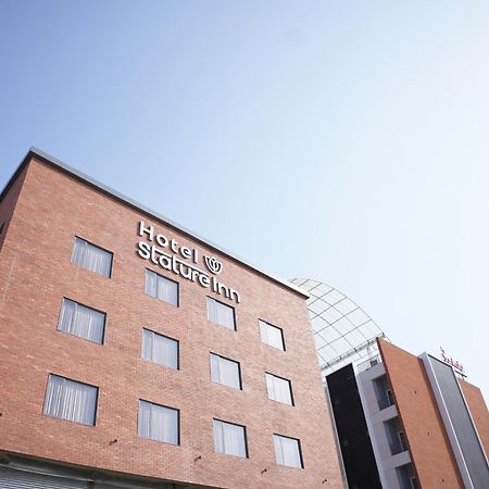 Hotel Stature Inn Kevadia Exteriör bild